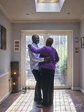 Couple dancing at home