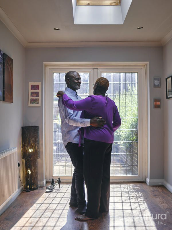 Couple dancing at home