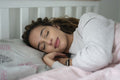 Woman sleeping in bed