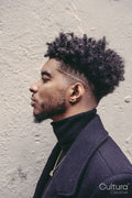Pennsylvania, Philadelphia, Profile of stylish man against white wall