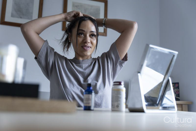Woman preparing hair at home
