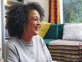 Woman smiling at home