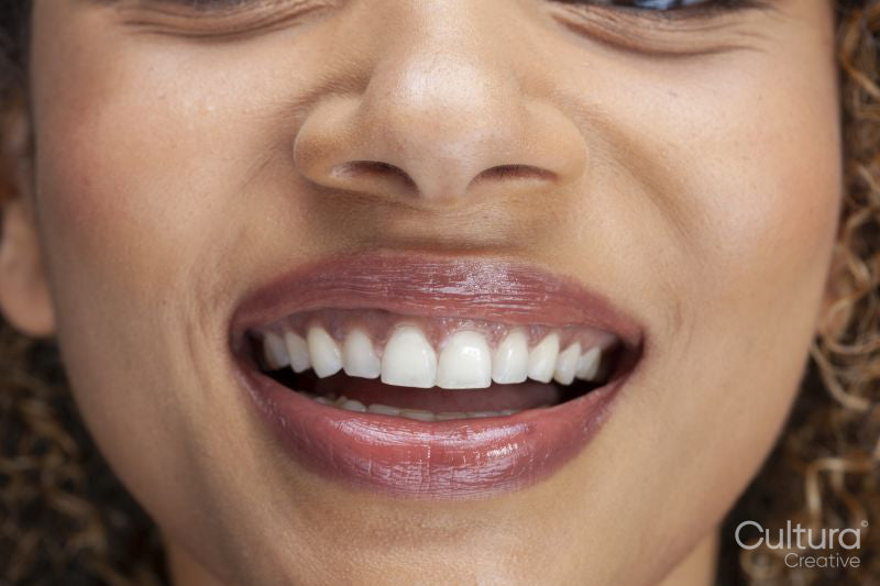 Close-up of smiling woman's lips
