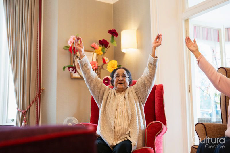 Senior woman exercising in nursing home