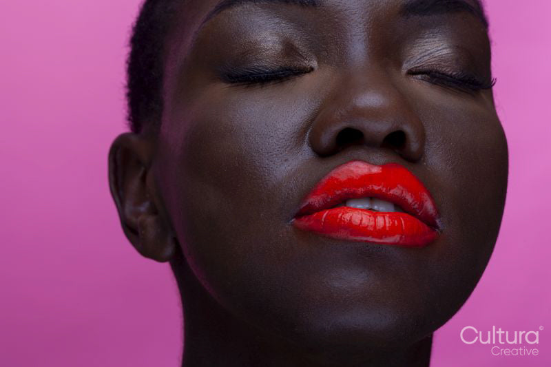 Beauty portrait of a model wearing red lipstick
