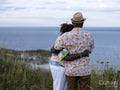 Senior couple looking at sea from cliff