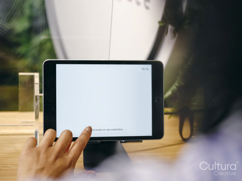 Woman using digital tablet