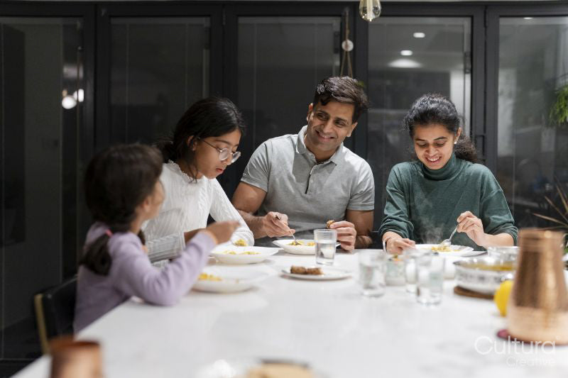 Family dining at home in evening