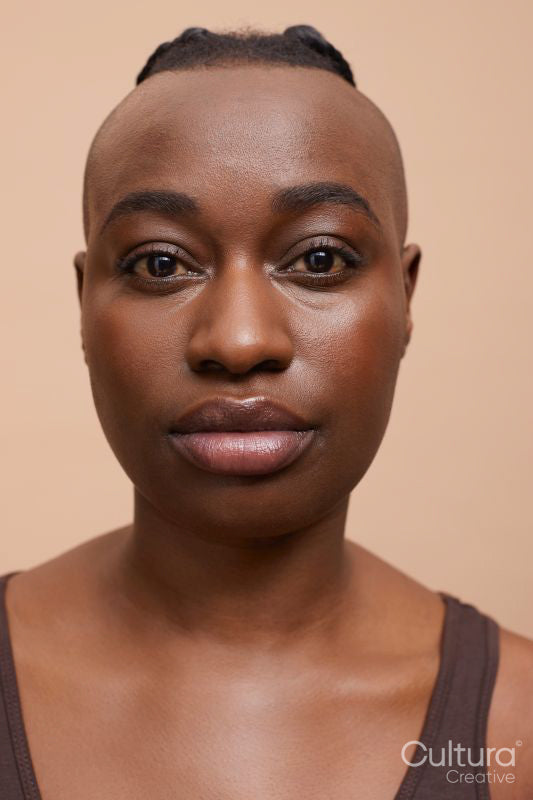Portrait of beautiful woman with mohawk hair