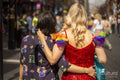 Two women at London Pride, rear view