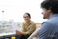 Creative professionals having meeting on office terrace