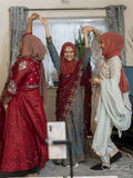 Women dancing during Ramadan celebration at home