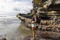 Indonesia, Bali, Female tourist looking at sea view