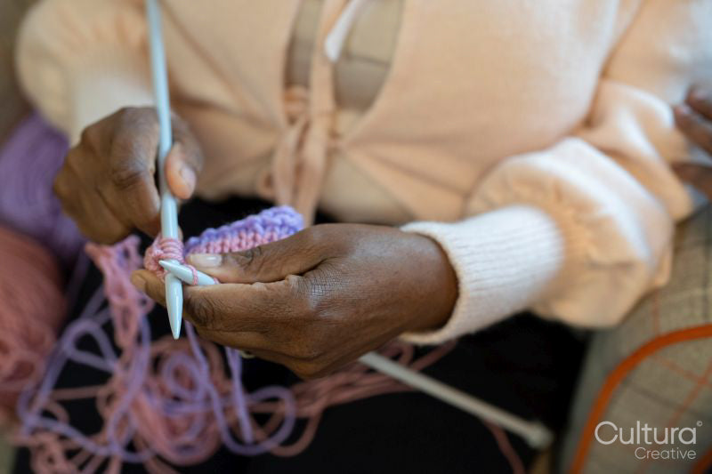 Close-up of senior woman knitting