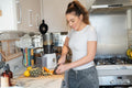 Woman preparing meal in kitchen