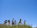 Family with children on summer walk