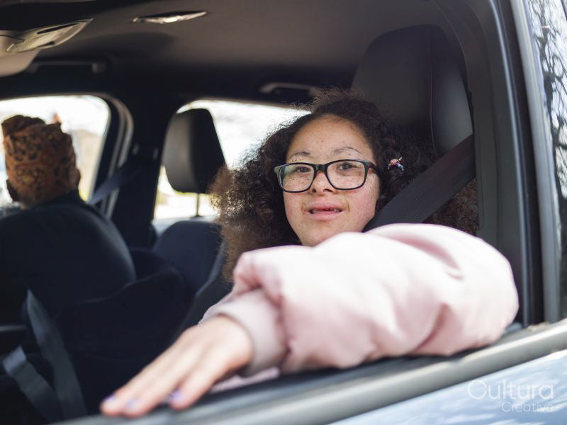Girl and woman in car