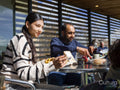 Couple sitting at restaurant table