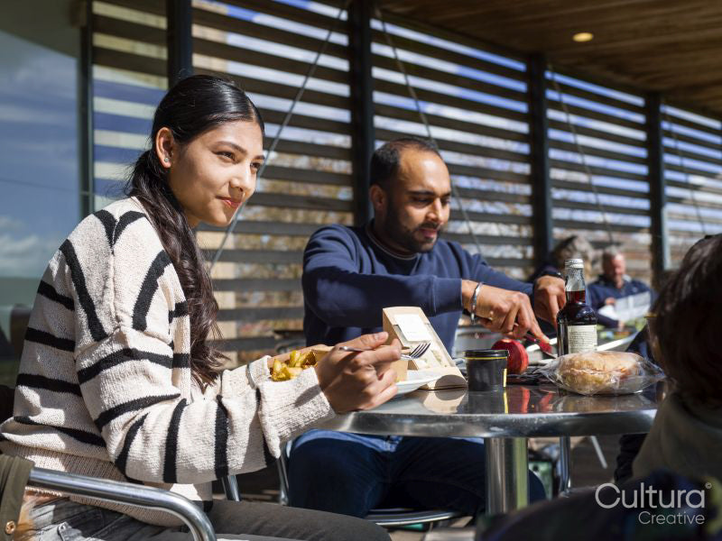 Couple sitting at restaurant table
