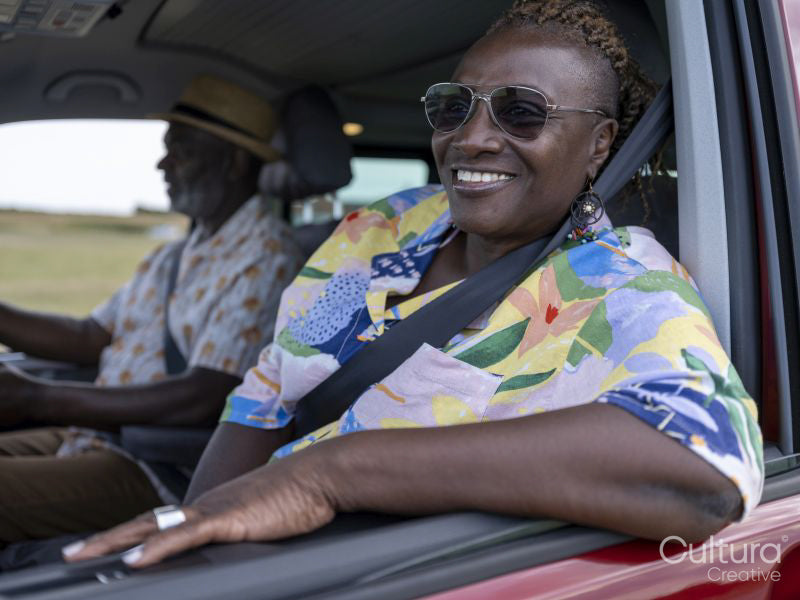 Senior couple traveling in van