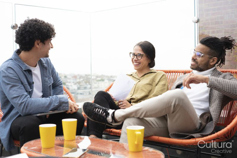 Creative professionals having meeting on office terrace