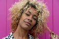 Portrait of woman with curly hair