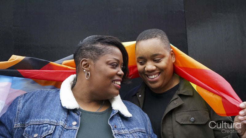 Two women with pride flag