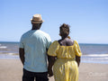 Mature couple standing on beach
