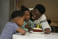 Father and children celebrating birthday