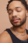 Studio portrait of happy handsome man