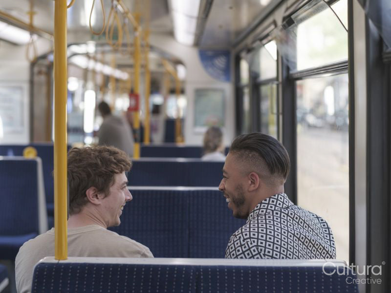 South Yorkshire, Smiling couple talking in tram