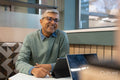 Smiling businessman working in office
