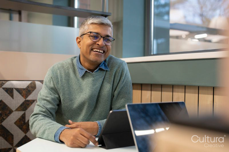 Smiling businessman working in office