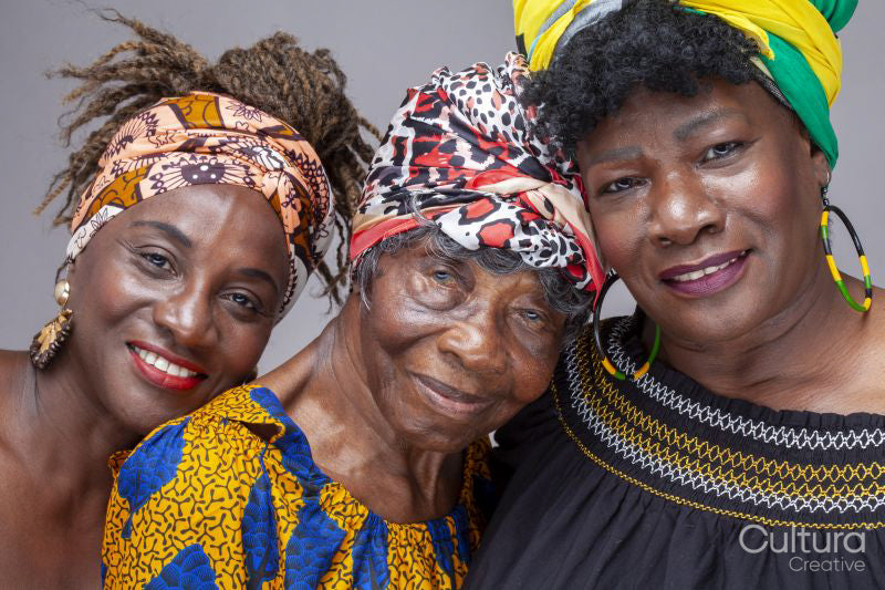 Portrait of senior woman with mature daughters