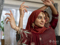 Women dancing during Ramadan celebration at home