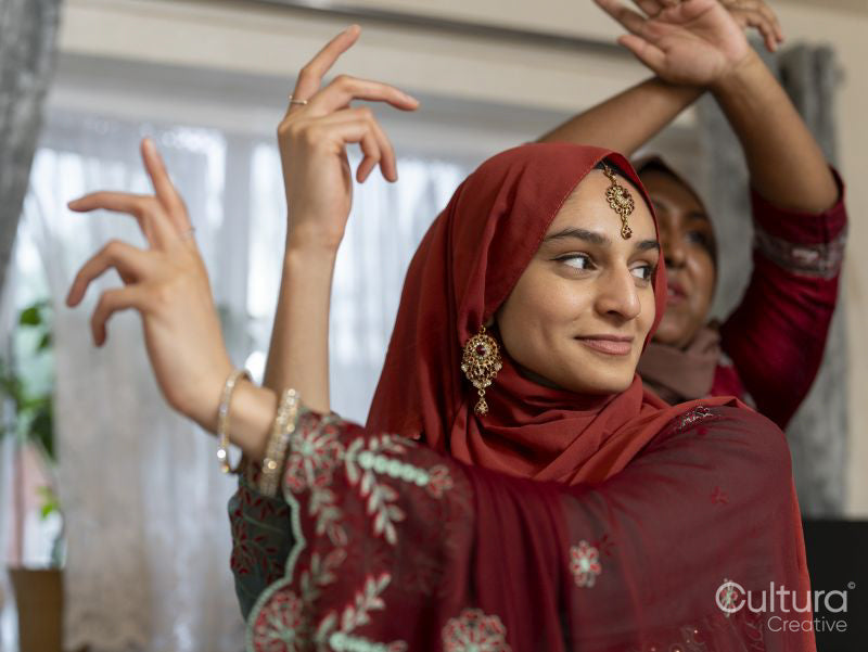 Women dancing during Ramadan celebration at home