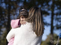 Mother hugging daughter with Down syndrome