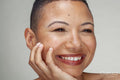 Studio portrait of smiling woman