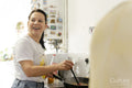 Mature woman preparing food in kitchen