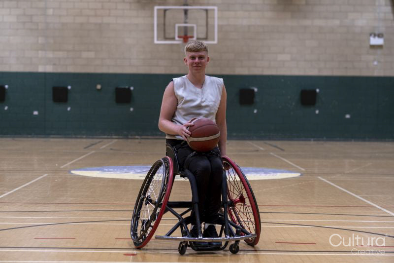 Portrait of male basketball player in wheelchair