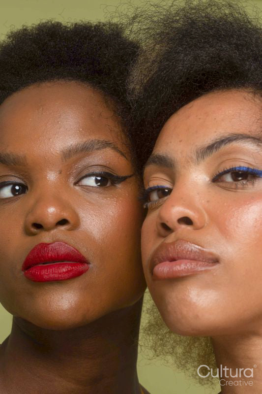 Close-up of two women cheek to cheek