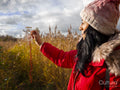 Female hiker using compass