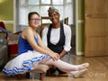 Portrait of mother and daughter with Down syndrome in ballerina costume