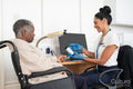 Smiling female doctor holding medical sample in office