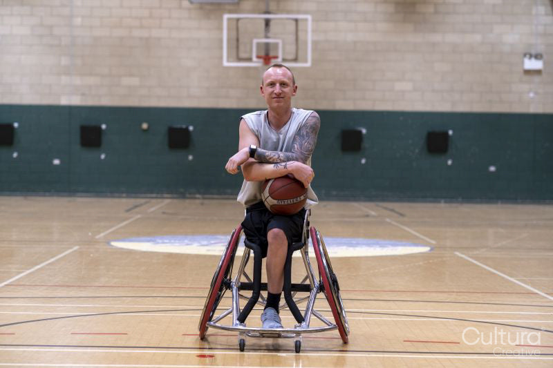 Portrait of male basketball player in wheelchair
