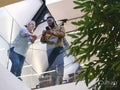 Low angle view of coworkers in office corridor