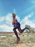 Fashion shot of young woman by river