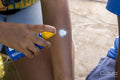 People applying sunscreen