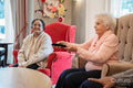 Senior people watching tv in nursing home