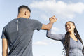 Couple of athletes doing high five